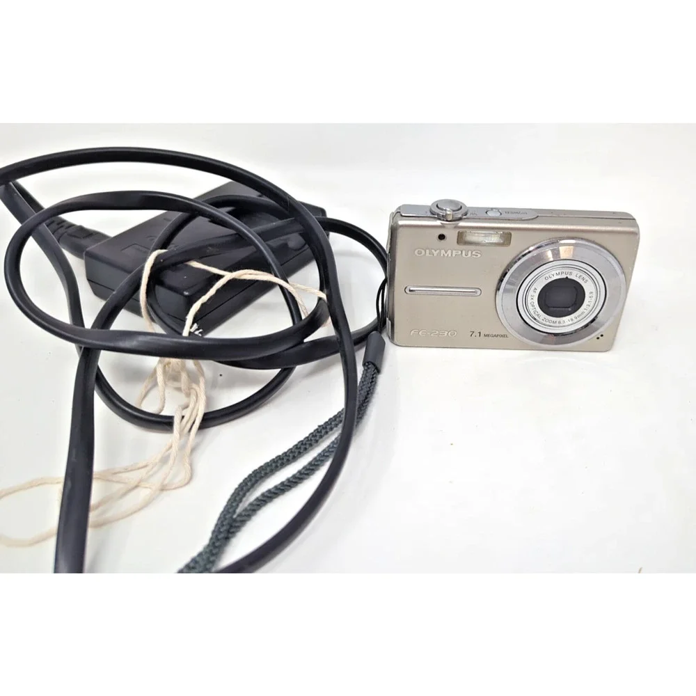 Olympus FE-230 7.1 MP Digital Camera - Silver Compact PARTS OR REPAIR battery